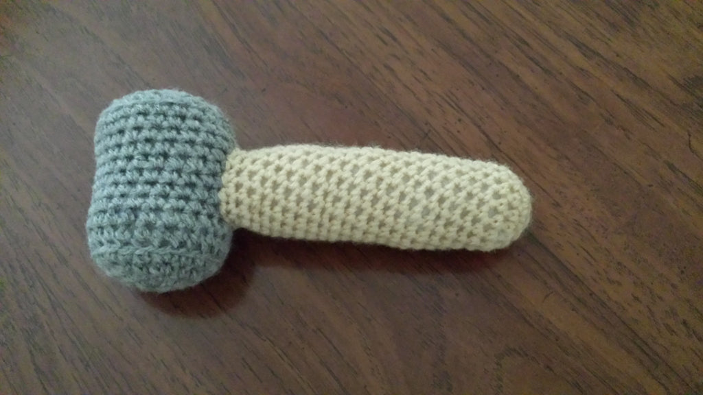 Celebrate National Skilled Trades Day with a Hammer Baby Rattle Crochet Pattern