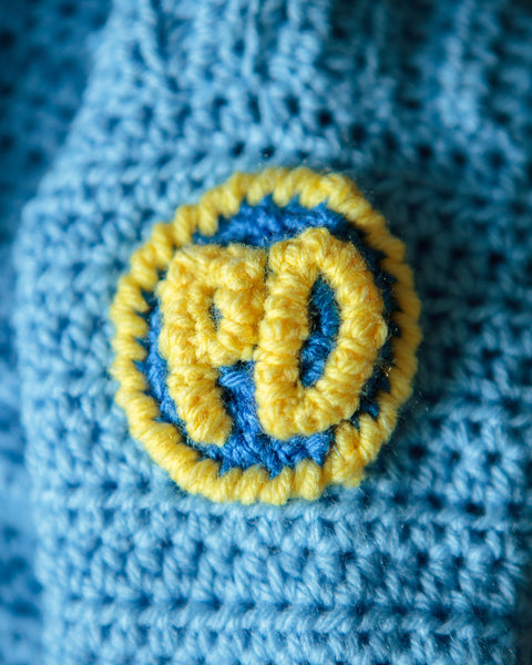 Baby Police Uniform Sweater plus Donut-Shaped Rattle Crochet Kit - size NB to 3 mth, 3-6 mth, or 9-12 mth